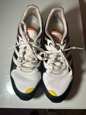 Adidas Retro White Black Sneakers with Yellow & Orange Accents